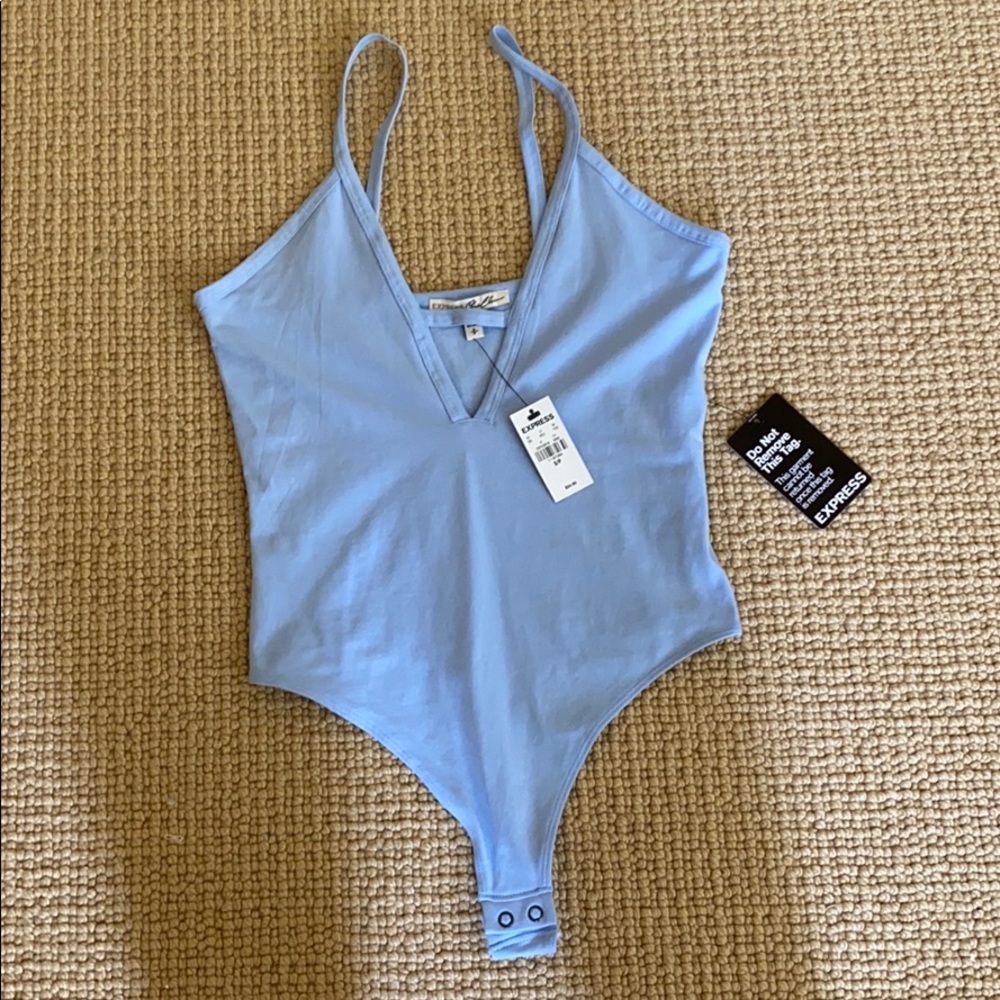 NWT! Sky Blue Express Body Suit! Never Worn! 🦋